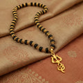 Karungali Gold Cap Mala with Om & Trishool Pendant